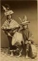 Studio portrait of two men with drums