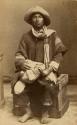 Studio portrait of man sitting