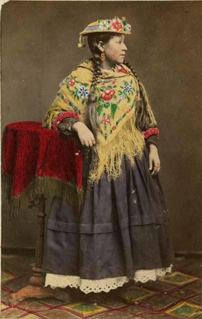 Studio portrait of woman standing