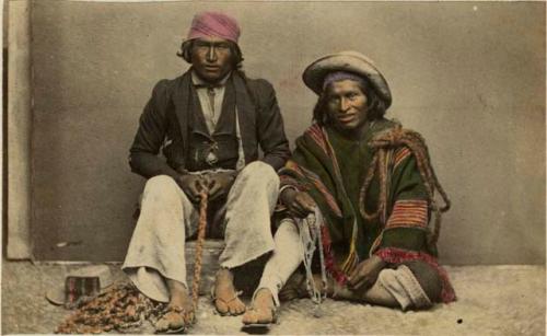 Studio portrait of two men sitting