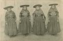 Four women standing