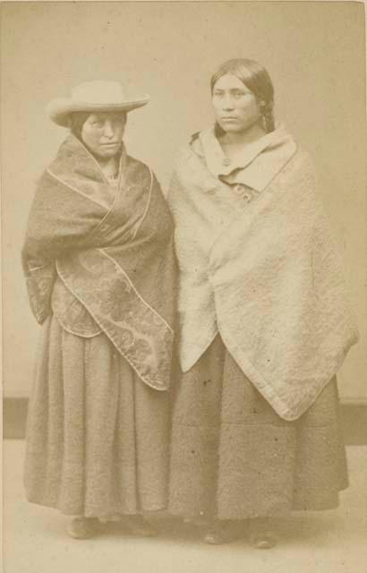Studio portrait of two women standing