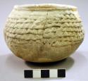 Small corrugated pottery jar - restorable
