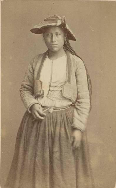 Studio portrait of woman standing