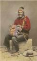 Studio portrait of man with woven bag