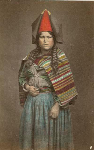 Studio portrait of woman standing