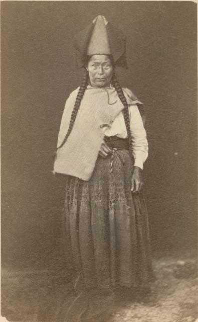 Studio portrait of woman standing