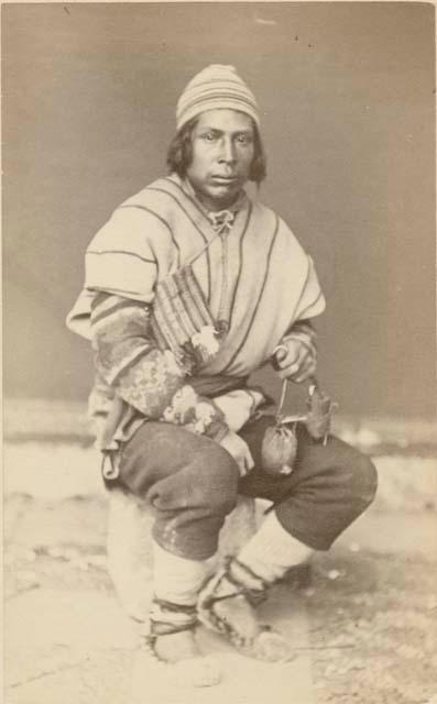 Studio portrait of man sitting