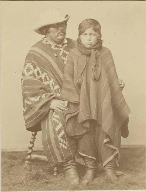 Studio portrait of a man and child