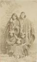 Studio portrait of a group of men and boys