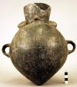 Flask shaped vessel of black ware