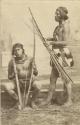 Studio portrait of two men with bow and arrows