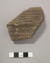 Ceramic sherd, grooved and impressed