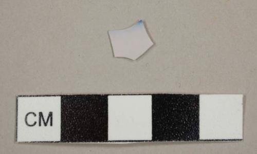 Tin-glazed earthenware sherd with pink-purple and blue glaze