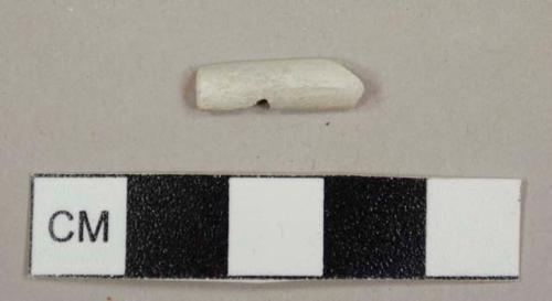 Kaolin/White ball clay pipe stem fragment split lengthwise; 7/64 in bore diameter