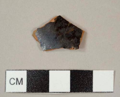 Black lead-glazed red earthenware sherd, possibly Buckley type