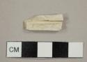 Kaolin/White ball clay pipe stem fragment, split lengthwise, with a 5/64 in bore diameter