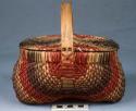 Colorful split ash wickerwork basket with handle and two closing flaps