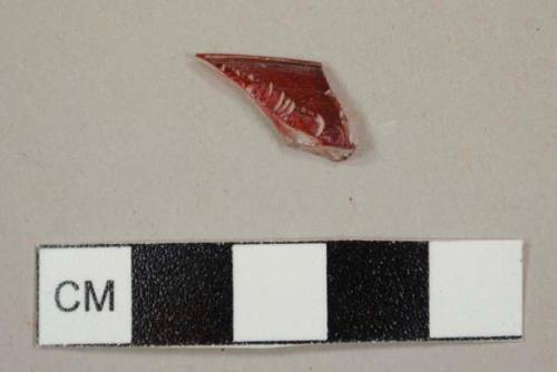 Ruby glass rim fragment from a tumbler with one layer of red and one layer of colorless glass