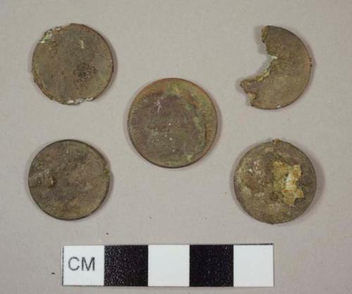 Oxidized coins, three pennies and one nickel with dates: 1998, 198-, eroded