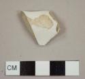 Ironstone rim sherd to a pitcher or jar with flared lip