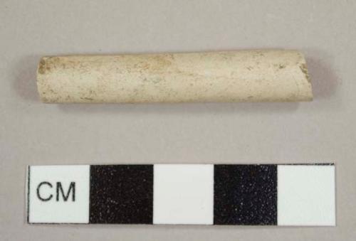 White ball clay pipe stem fragment with a 5/64 inch bore diameter