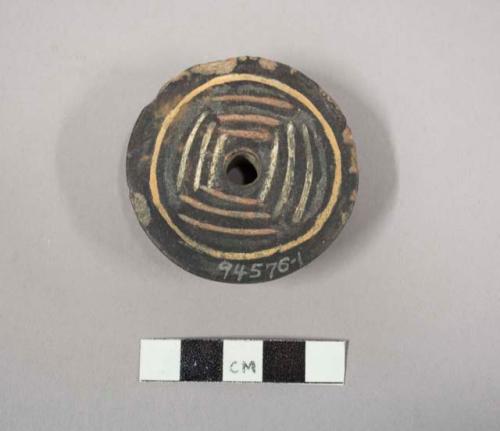 Decorated spindle whorl