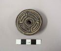 Decorated spindle whorl