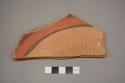 Incised potsherd (5.35" long)