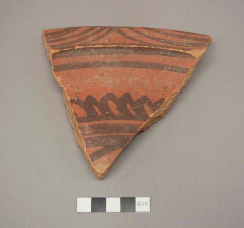 Painted potsherd (4.8" long)