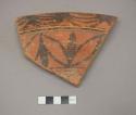 Painted potsherd (5.7" long)