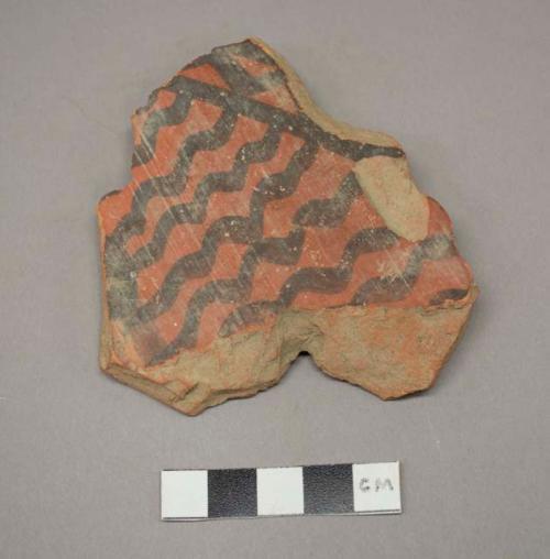 Painted potsherd (3.5" long)