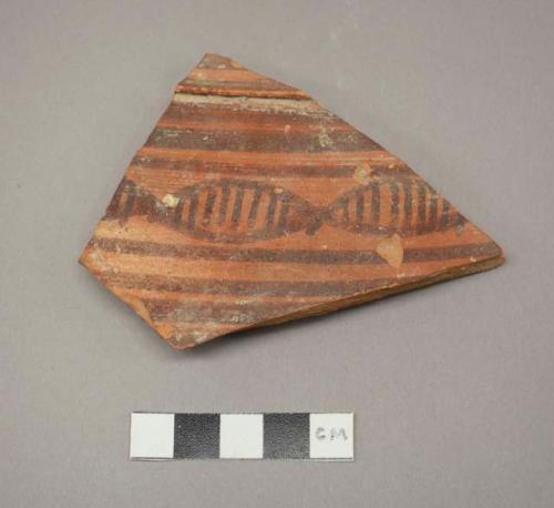 Painted potsherd (3.9" long)