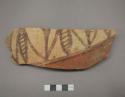 Painted potsherd (7.3" long)