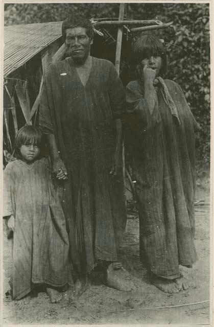 Man and two children