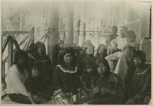Group sitting inside a structure