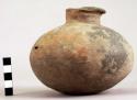 Earthen jar with lip