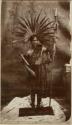 Man with headdress and spear