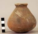 Small earthen jar, conical