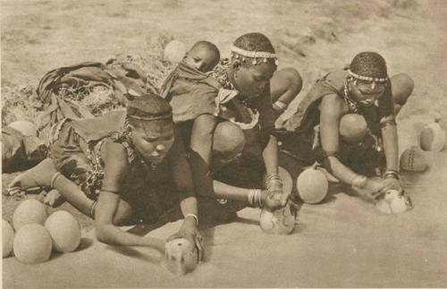 Group of women and ostrich egg-shells