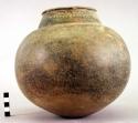 Ceramic jar, incised band around neck, tapering round base