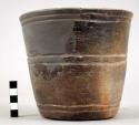 Black-brown ware broken pottery vessel