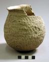 Corrugated pottery handled jar