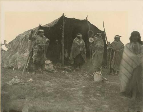 Group in front of a tent