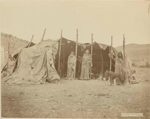 Group in front of a tent