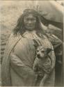 Woman holding a dog