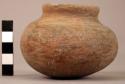 Earthen jar with lip