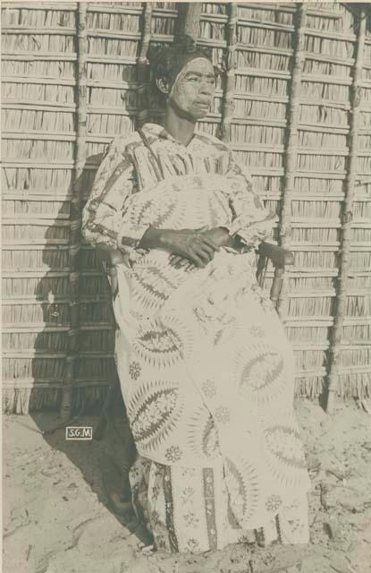 Woman standing in front of a structure