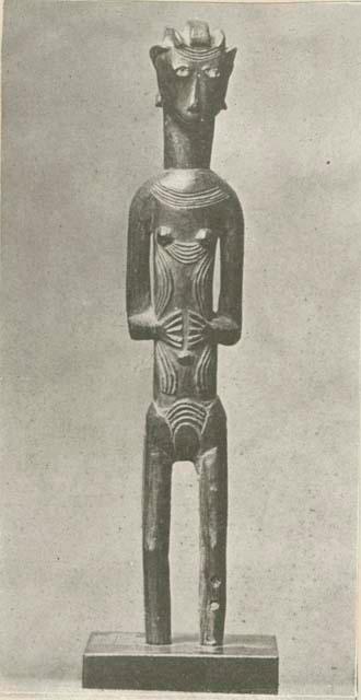 Female statuette of ebony with lead eyes