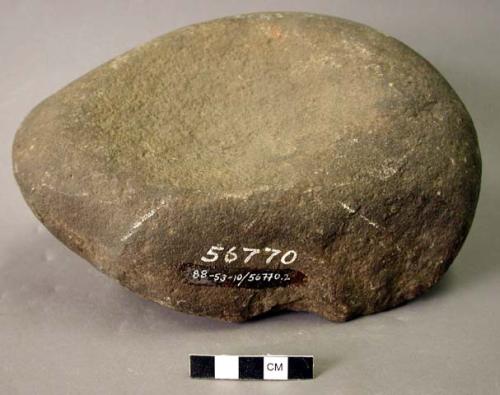 Ground stone mortar.